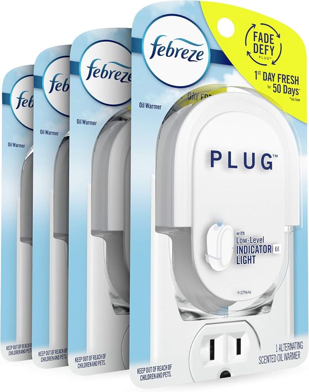 Photo 1 of Febreze Plug In Air Freshener Fade Defy Plugs, Scented Oil Warmer- Pack of 4