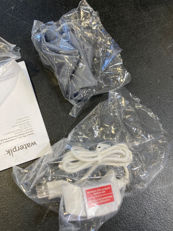 Photo 1 of Waterpik Cordless Advanced 2.0 Water Flosser For Teeth, Gums, Braces, Dental Care With Travel Bag and 4 Tips, ADA Accepted, Rechargeable, Portable, and Waterproof, White WP-580, Packaging May Vary