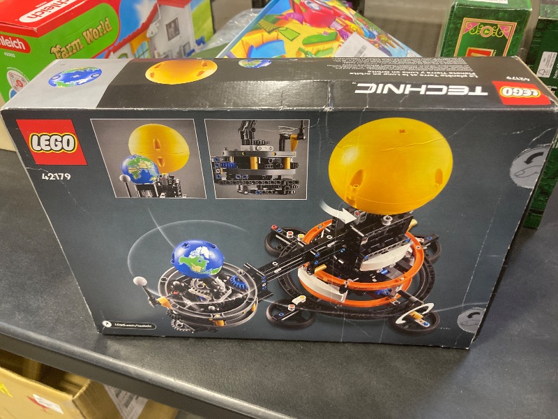 Photo 1 of LEGO Technic Planet Earth and Moon in Orbit Building Set, Outer Space Birthday Gift for 10 Year Olds, Solar System Space Toy for Imaginative, Independent Play, Space Room Décor for Boys & Girls, 42179