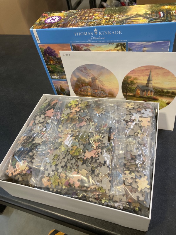 Photo 1 of Ceaco - 8 in 1 Multipack - Thomas Kinkade - (2) Round 300 Piece, (4) 550 Piece, (1) 750 Piece (1) 1000 Piece Jigsaw Puzzles