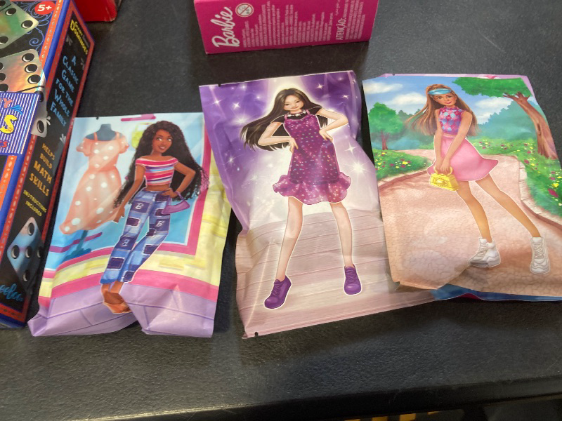 Photo 1 of Barbie Clothes, Fashion Pack with 13 Pieces of Doll Clothing, 8 Accessories & 8 Pairs of Shoes, 65+ Unique Looks