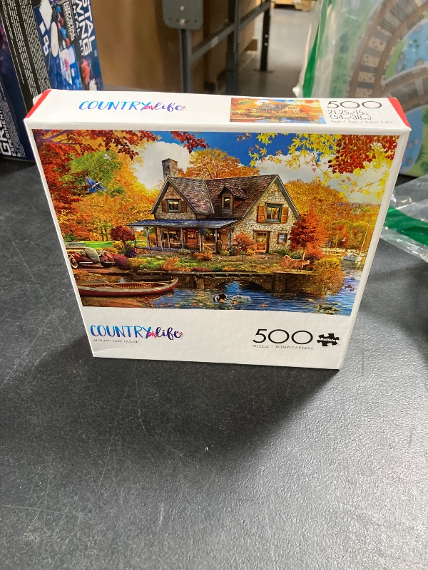 Photo 1 of Buffalo Games - Angelo Bonito - Autumn Lake House - 500 Piece Jigsaw Puzzle for Adults -Challenging Puzzle Perfect for Game Nights - Finished Size is 21.25 x 15.00