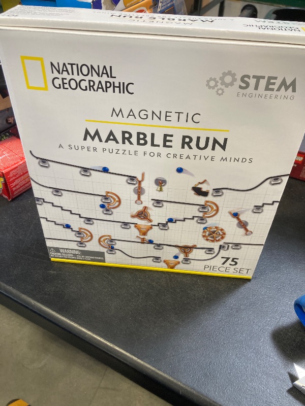 Photo 1 of NATIONAL GEOGRAPHIC Magnetic Marble Run - 75-Piece STEM Building Set for Kids & Adults with Magnetic Track & Trick Pieces & Marbles for Building A Marble Maze, STEM Project (Amazon Exclusive)
