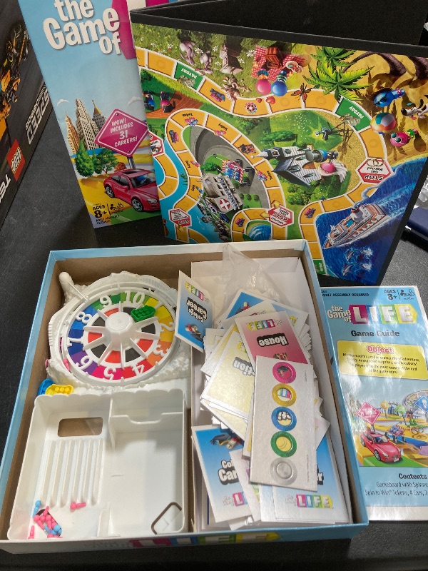 Photo 1 of Hasbro Gaming The Game of Life Board Game, Family Games for Kids Ages 8+, Includes 31 Careers, Family Board Games for 2-4 Players, Family Gifts (Amazon Exclusive)