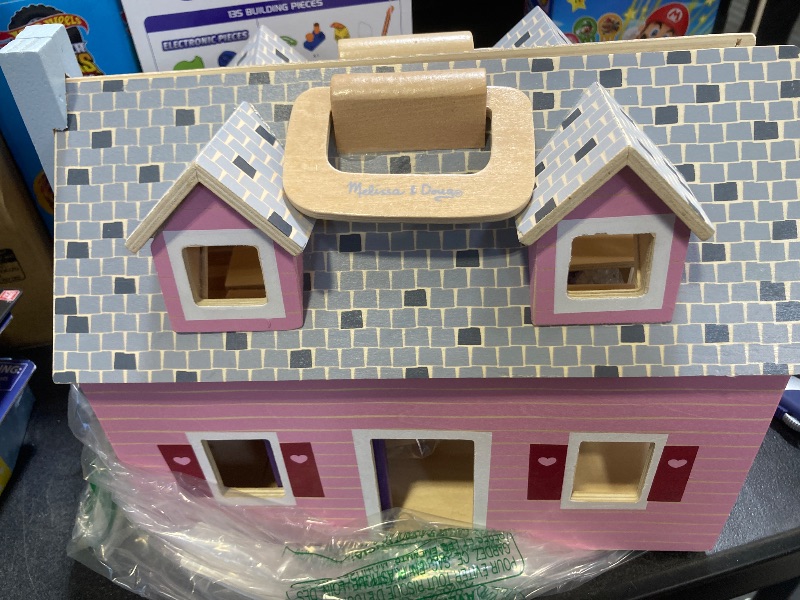 Photo 1 of Melissa & Doug Fold and Go Wooden Dollhouse With 2 Dolls and Wooden Furniture,Multi,One Size