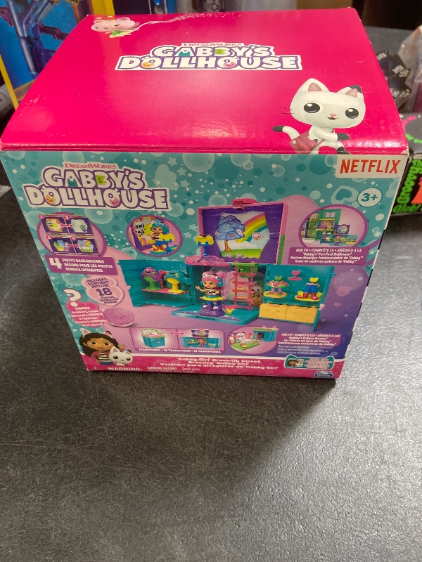 Photo 1 of Gabby’s Dollhouse, Dress-Up Closet Portable Playset with a Gabby Doll, Surprise Toys and Photo Shoot Accessories, Kids Toys for Ages 3 and up