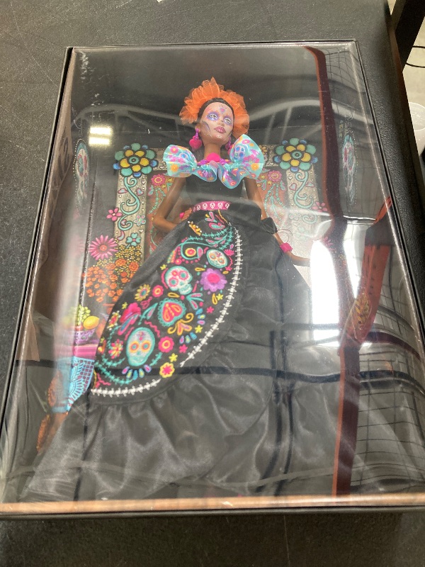 Photo 1 of Barbie Signature Doll, 2024 Día De Muertos Collectible in Black Dress with Blue Ruffle Top, Embroidered Print, and Colorful Accessories