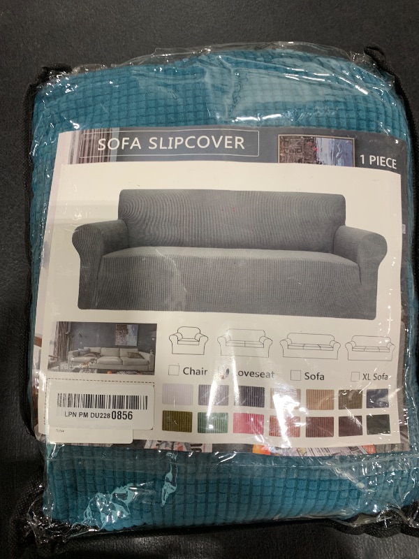 Photo 1 of ZNSAYOTX Super Stretch Couch Cover Love Seat Sofa Covers for Living Room Dogs Pet Friendly Furniture Protector Spandex Loveseat Slipcovers with Anti Slip Foam Sticks (Peacock Teal, Loveseat)