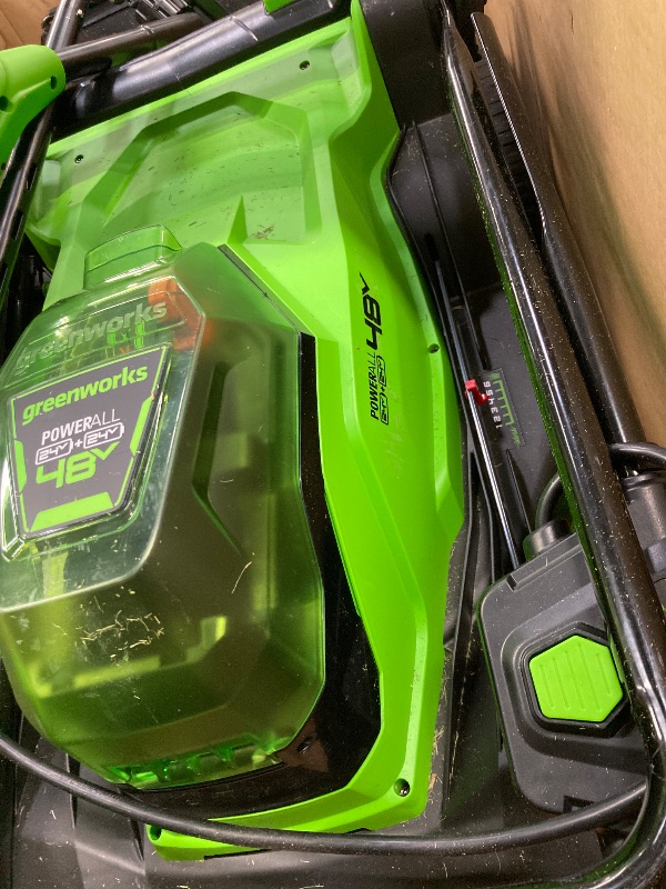 Photo 1 of ***(ITEM AS SHOWN IN BOX, USED, MISSING PIECES, DIRTY/GRASS RESIDUE ON EQUIPMENT, SOME SCUFFS/SCRATCHES, NOT TESTED)*** 

Greenworks 48V (2x24V) 17" Brushless Mower+12" String Trimmer +320CFM (2) 4.0Ah 