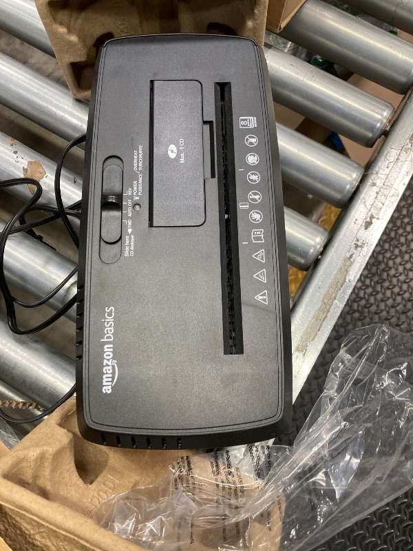 Photo 1 of Amazon Basics 8-Sheet Strip Cut Paper, CD, and Credit Card Shredder with Auto-Off Compact, Portable Design, No Basket, Extendable Arm, Black