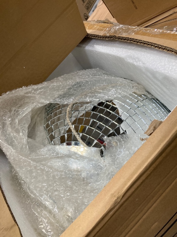 Photo 1 of 10-Inch Silver Mirror Disco Ball - The Ultimate Party Decoration for Wedding - Transform Your Event with Dazzling Light Reflections - Ideal for Dance Parties and Special Occasions - Silver