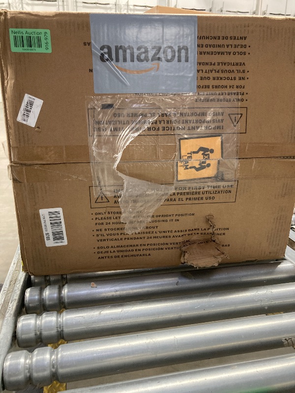 Photo 1 of Amazon Basics Portable AC (Air Conditioner) with Heat Pump, Dual Purpose (Cool and Warm), Cools 550 Square Feet, With Remote Control and Timer, 13,000 BTU ASHARE / 10000 BTU SACC, White