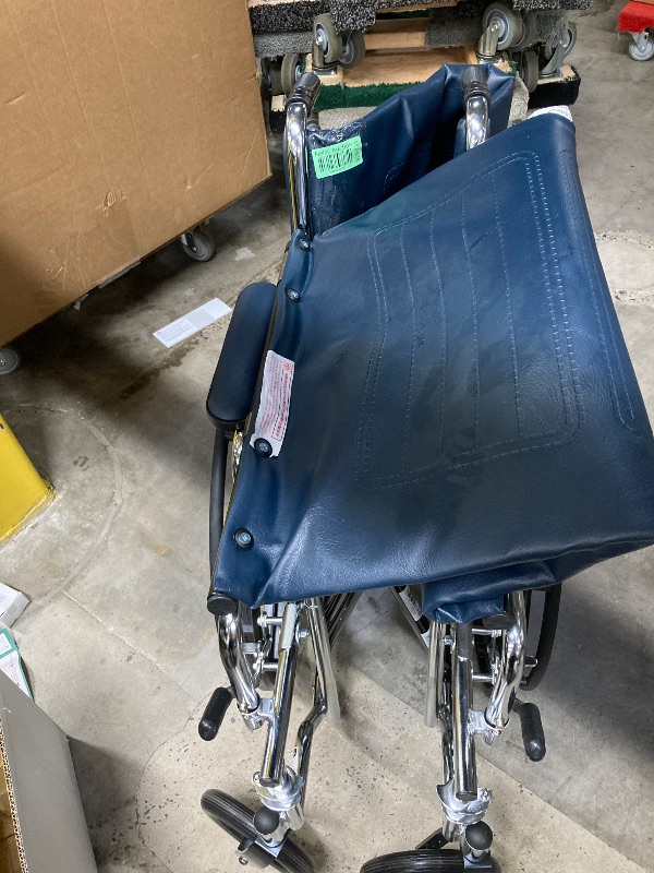 Photo 1 of *Similar Item* Wheel Chair, Blue
