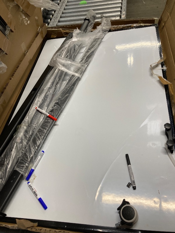 Photo 1 of *Board is Bent* FOUKUS Double-Sided Magnetic White Board: 48" x 36" Mobile Dry Erase Board with Stand, Large White Board for Office, Home, School, Classroom - Markers, Eraser, Magnets Included

