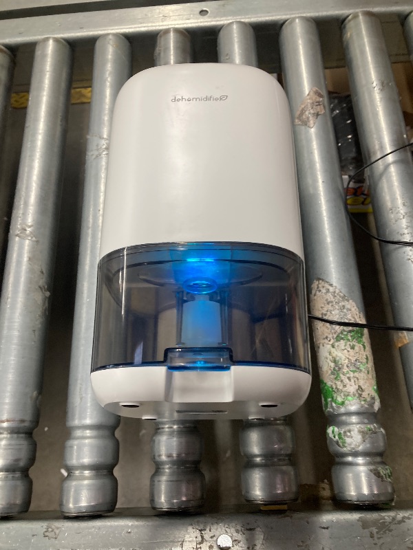 Photo 1 of **NOT IN ORIGINAL PACKAGING**Dehumidifier,TABYIK 35 OZ Small Dehumidifiers for Room for Home, Quiet with Auto Shut Off, Dehumidifiers for Bedroom (280 sq. ft), Bathroom, RV, Closet
