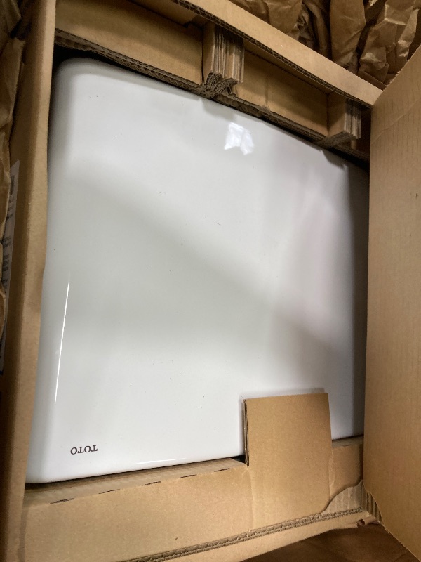 Photo 1 of ****THIS IS THE TANK ONLY*****TOTO Drake Two-Piece Elongated 1.6 GPF Universal Height TORNADO FLUSH Toilet with CEFIONTECT, Cotton White - CST776CSFG#01