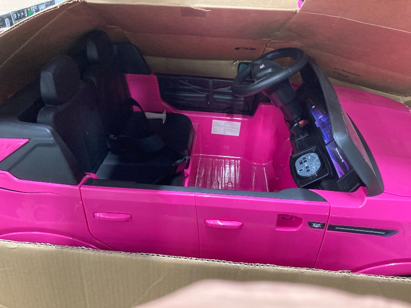 Photo 1 of *****In some parts it is broken*****

Cadillac Escalade IQ 24V Kids Ride on Car,Wisairt 2 Seater Battery Powered Electric Vehicle w/ Remote Control(Pink)
