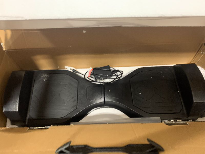 Photo 1 of Hover-1 Dash Self Balancing Electric Hoverboard with 5 mph Max Speed, Dual 75W Motors, 6.3" Tires, 3 Miles Range, and LED Lights Self Balancing Scooter. 