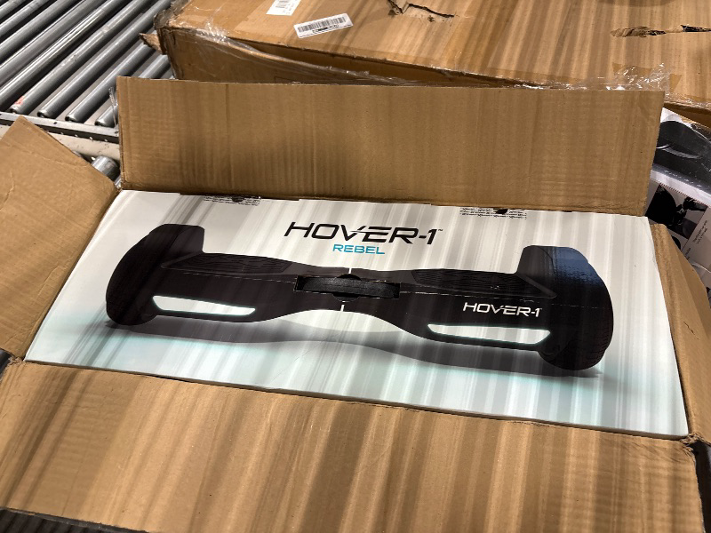 Photo 1 of Hover-1 Dash Self Balancing Electric Hoverboard with 5 mph Max Speed, Dual 75W Motors, 6.3" Tires, 3 Miles Range, and LED Lights Self Balancing Scooter. 