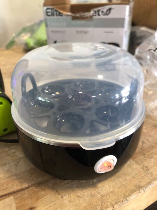 Photo 1 of Elite Gourmet EGC-007B# Rapid Egg Cooker, 7 Easy-To-Peel, Hard, Medium, Soft Boiled Eggs, Poacher, Omelet Maker, Auto Shut-Off, Alarm, 16-Recipe Booklet, Black