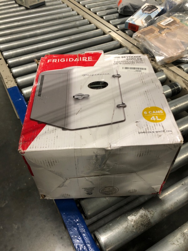 Photo 1 of Frigidaire EFMIS129-WHITE, Mini Portable Fridge, 4 Litres Capacity, Chills Six 12oz Cans, 100% Freon-Free & Eco Friendly, Beverage Cooler- WhitE