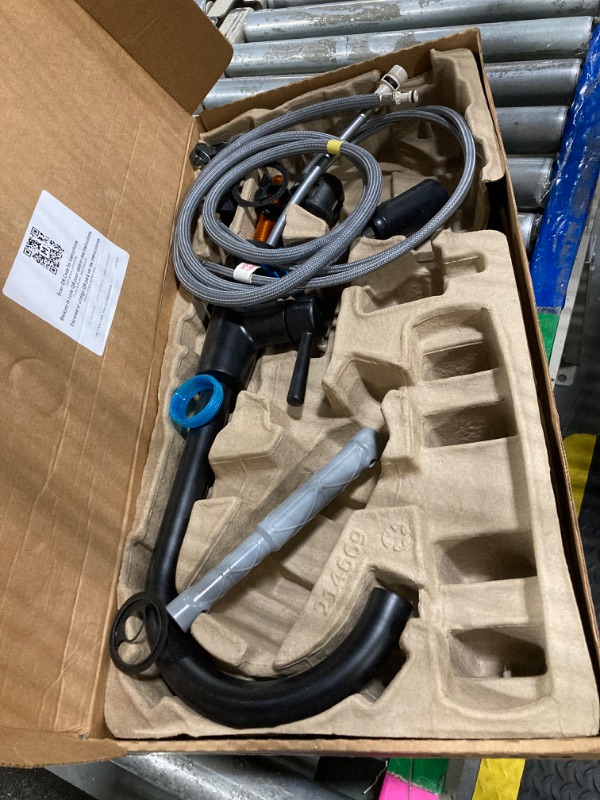 Photo 1 of Moen Riley Matte Black One-Handle Modern Pulldown Kitchen Faucet Featuring Power Boost for a Faster Clean and Reflex Docking System for The Spray Head, 7402BL.