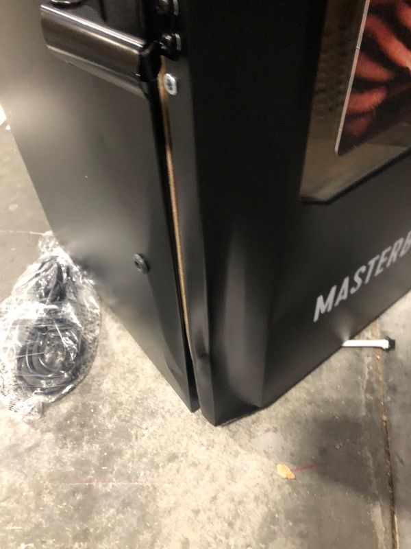 Photo 1 of Masterbuilt®710 WiFi Digital Smoker, Vertical Design, 711 Cooking Sq. Inches, 4 Chrome Coated Smoking Racks, Wood Chip Loader, Electric Fuel Source to Plug in and Start Cooking, Black Model MB20070924
