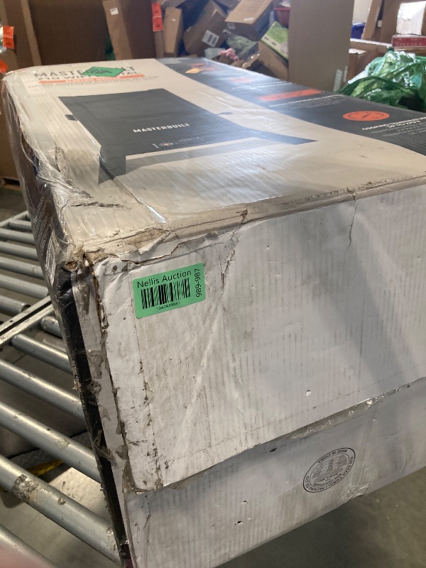 Photo 1 of Masterbuilt®710 WiFi Digital Smoker, Vertical Design, 711 Cooking Sq. Inches, 4 Chrome Coated Smoking Racks, Wood Chip Loader, Electric Fuel Source to Plug in and Start Cooking, Black Model MB20070924