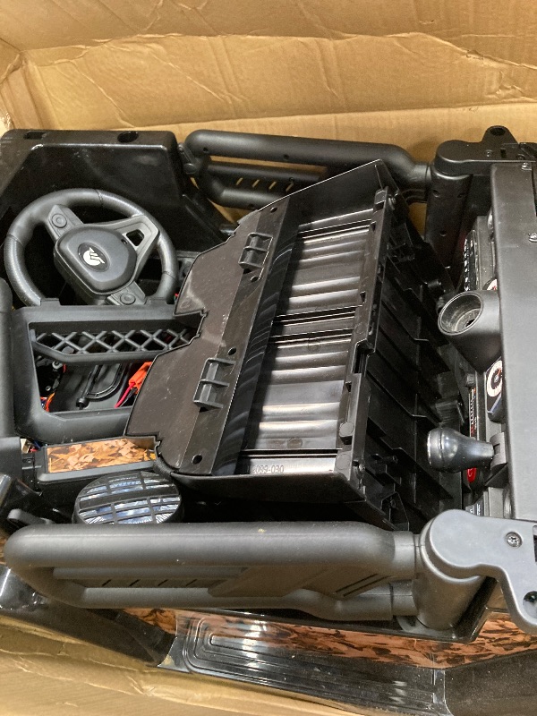 Photo 1 of ***(MISSING PARTS - SELLIING AS PARTS ONLY)*** 
Outdoor Cruiser 12V Kids Ride-On Car with Remote Control - Dual 25W Motors, 4.5AH Battery, Safety Belt, Emergency Stop, Spring Suspension, Smooth Terrain Drive, Max Load 66 lbs, Ages 3-8 Years, Camo  ***(BOX