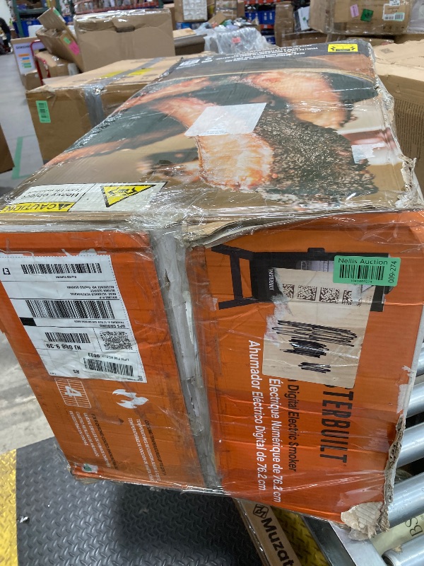 Photo 1 of ***(PARTS ONLY -SELLING AS PARTS ONLY)*** BOX RIPPED/TORN*** 
Masterbuilt® 30-inch Digital Electric Vertical BBQ Smoker with Leg Kit, Side Wood Chip Loader and 710 Cooking Square Inches in Black, Model MB20070421