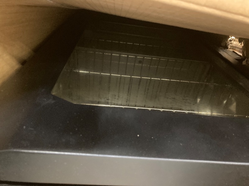 Photo 1 of ***(PARTS ONLY -SELLING AS PARTS ONLY)*** BOX RIPPED/TORN*** 
Masterbuilt® 30-inch Digital Electric Vertical BBQ Smoker with Leg Kit, Side Wood Chip Loader and 710 Cooking Square Inches in Black, Model MB20070421