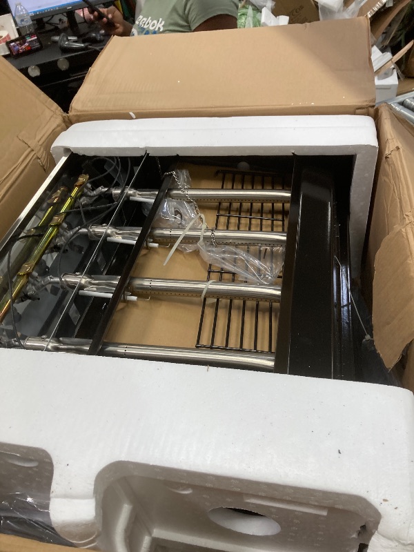 Photo 1 of ***(SOME DENTS, SCUFFS/SCRATCHES, BOX RIPPED/TORN)***
, Royal Gourmet 4-Burner Propane Gas Grill with Warming Rack, Outdoor BBQ Grill with 34,000 BTUs Output for Patio Garden Barbecue Grilling, Black & Silver