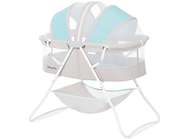Photo 1 of **** USED***Dream On Me Karley Bassinet in Blue & Grey, Lightweight Portable Baby Bassinet, Quick Fold and Easy to Carry , Adjustable Double Canopy, Indoor and Outdoor Bassinet with Large Storage Basket.