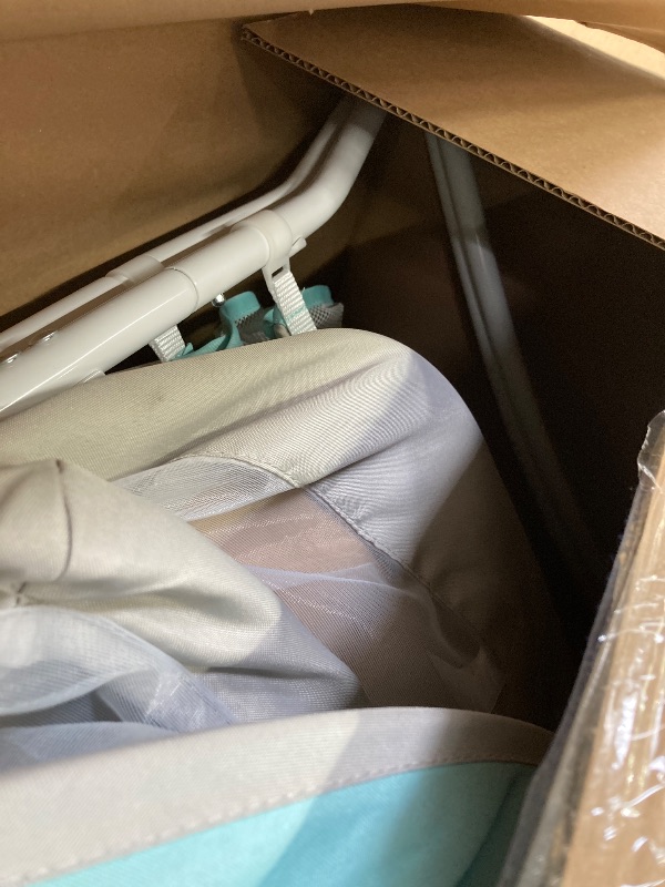 Photo 1 of **** USED***Dream On Me Karley Bassinet in Blue & Grey, Lightweight Portable Baby Bassinet, Quick Fold and Easy to Carry , Adjustable Double Canopy, Indoor and Outdoor Bassinet with Large Storage Basket.