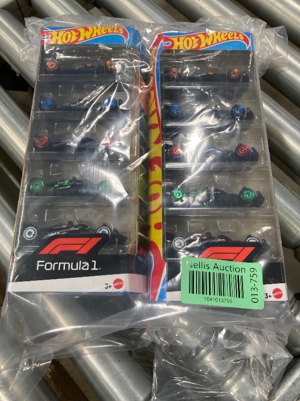 Photo 1 of **4 Pack Bundle**
Hot Wheels Toy Cars Formula 1, 4-Pack Bundle, Set of 5 Cars 1:64 Scale Die-Cast Vehicles Featuring F1 Racing Team Decos, Collectible Race Cars