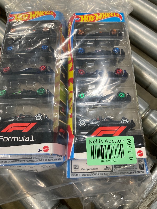 Photo 1 of **4 Pack Bundle**
Hot Wheels Toy Cars Formula 1: 4-Pack Combo, Set of 5 Cars, 1:64 Scale Die-Cast Vehicles Featuring F1 Racing Team Decos, Collectible Race Cars