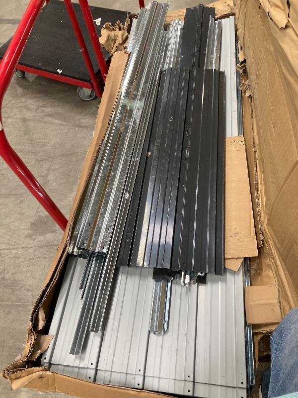 Photo 1 of *** This item has multiple boxes with it, please see pictures, 3 large boxes total***

10X12 FT Outdoor Metal Silding Door** and Frame Structure, Large Tool Sheds for Backyard Garden Patio Lawn, Black