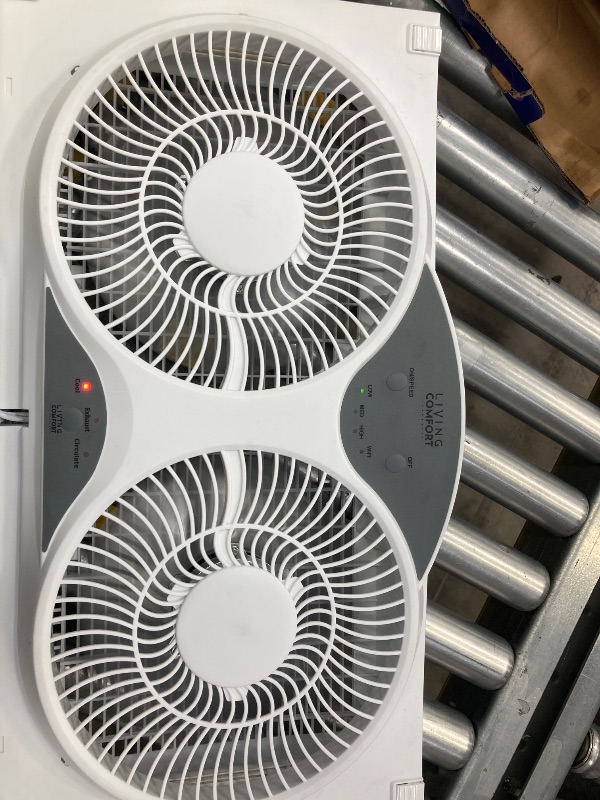 Photo 1 of **This fan does not have it two leg support stands,**

Comfort Zone Smart Wi-Fi Reversible Twin Window Fan with Cover and Bug Screen
