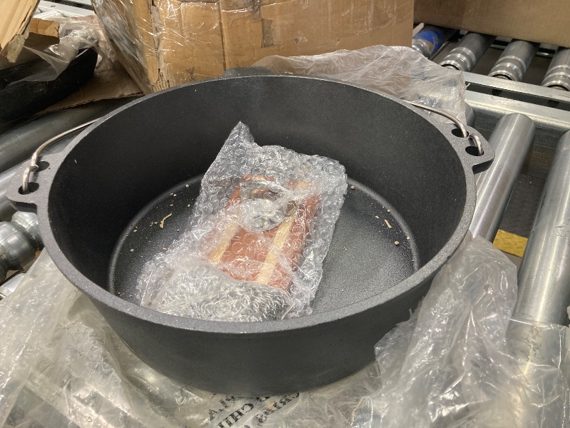 Photo 1 of ** There is a handle broken off on the grill piece, please see pictures below. **

Bruntmor Pre-Seasoned Cast Iron Cookware Set - 8-Piece Bundle with Skillets, Grill Pan, Dutch Oven, Pizza Pan, and Utensils - Durable Pots and Pans Set for Cooking - Ideal 