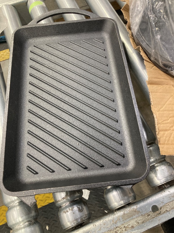 Photo 1 of ** There is a handle broken off on the grill piece, please see pictures below. **

Bruntmor Pre-Seasoned Cast Iron Cookware Set - 8-Piece Bundle with Skillets, Grill Pan, Dutch Oven, Pizza Pan, and Utensils - Durable Pots and Pans Set for Cooking - Ideal 
