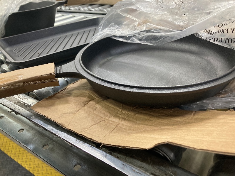 Photo 1 of ** There is a handle broken off on the grill piece, please see pictures below. **

Bruntmor Pre-Seasoned Cast Iron Cookware Set - 8-Piece Bundle with Skillets, Grill Pan, Dutch Oven, Pizza Pan, and Utensils - Durable Pots and Pans Set for Cooking - Ideal 