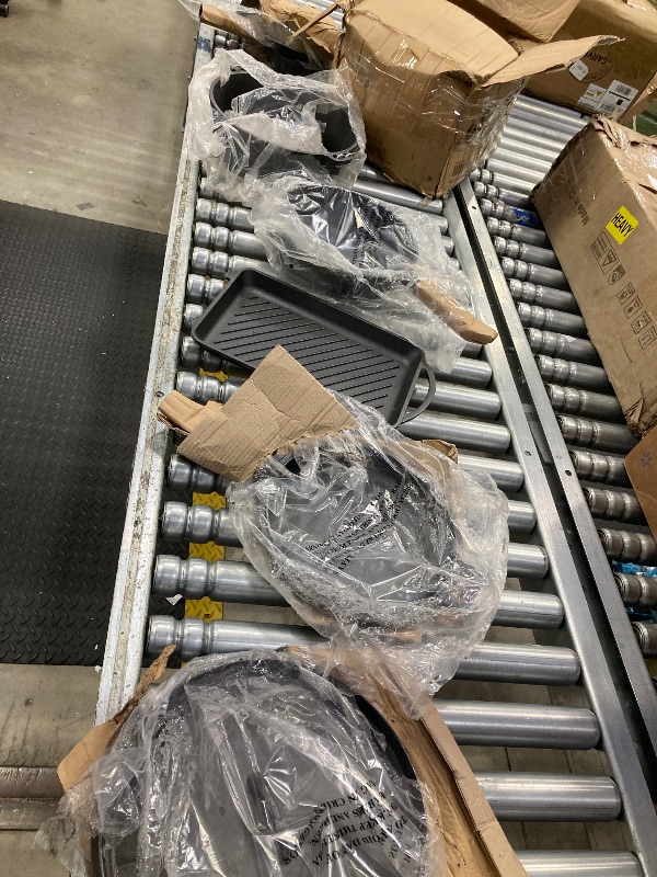 Photo 1 of ** There is a handle broken off on the grill piece, please see pictures below. **

Bruntmor Pre-Seasoned Cast Iron Cookware Set - 8-Piece Bundle with Skillets, Grill Pan, Dutch Oven, Pizza Pan, and Utensils - Durable Pots and Pans Set for Cooking - Ideal 