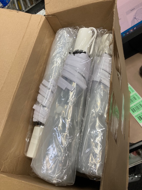 Photo 1 of 18 Pcs Clear Foldable Umbrellas Bulk Transparent Travel Umbrella Clear Umbrella Manual Open and Close Compact Folding Umbrella for Wedding Anniversary Christmas Party Favors (White Trim)