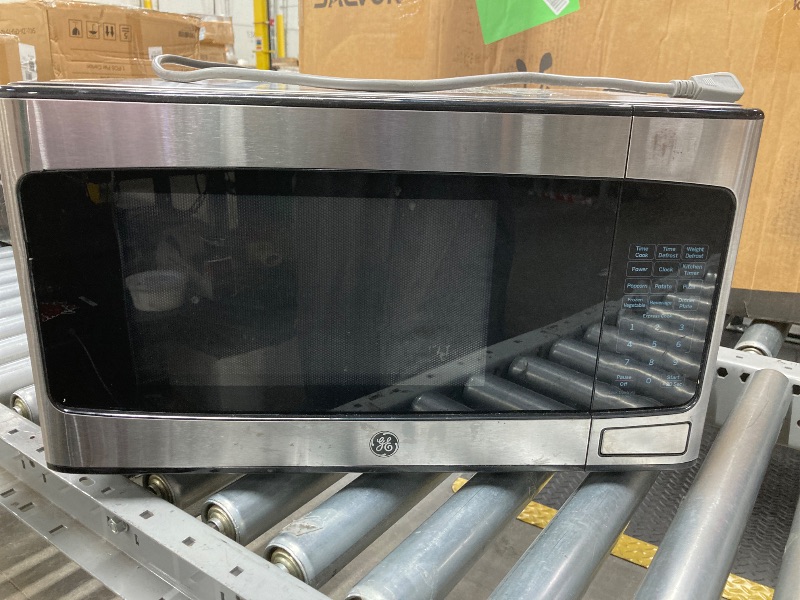 Photo 1 of ***Glass Interior Plate is Missing*** GE Microwave 20Wx11Hx14.5 Depth.