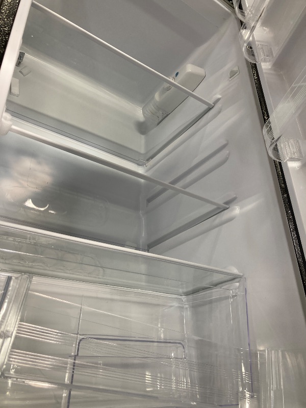 Photo 1 of ***MISSING A DOOR HANDLE, MANY DINGS & DENTS*** Frigidaire, 2 Door Apartment Size Refrigerator/Freezer Combo 54"H x 21" W.