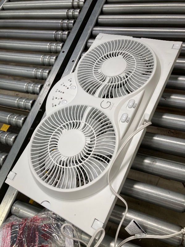 Photo 1 of ***(SELLING AS PARTS ONLY - DO NOT WORK-PARTS ONLY)*** 
Genesis Twin Fan High Velocity Reversible AirFlow Fan, LED Indicator Lights Adjustable Thermostat & Max Cool Technology, ETL Certified, White (A1WINDOWFAN)