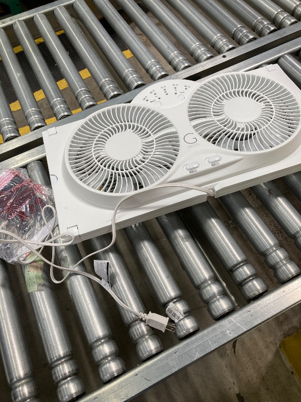 Photo 1 of ***(SELLING AS PARTS ONLY - DO NOT WORK-PARTS ONLY)*** 
Genesis Twin Fan High Velocity Reversible AirFlow Fan, LED Indicator Lights Adjustable Thermostat & Max Cool Technology, ETL Certified, White (A1WINDOWFAN)