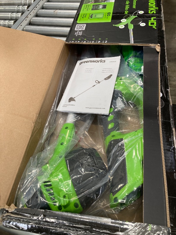 Photo 1 of ***(PARTS ONLY -SELLING AS PARTS ONLY)***
Greenworks 40V 12" String Trimmer with 2.0 Ah Battery & Charger 2101602 ***(BOX RIPPED/TORN)***