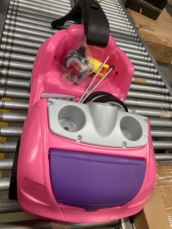 Photo 1 of *** Missing the steering wheels** Step2 Whisper Ride II Ride On Push Toy Car, Pink – Ride On Car with Included Seat Belt, Easy Storage and Transport, Makes a Great Stroller Alternative