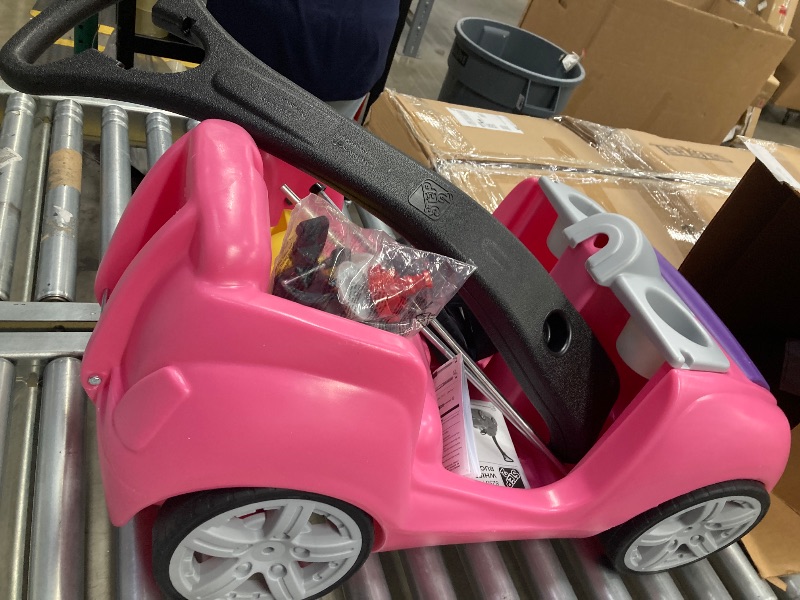 Photo 1 of *** Missing the steering wheels** Step2 Whisper Ride II Ride On Push Toy Car, Pink – Ride On Car with Included Seat Belt, Easy Storage and Transport, Makes a Great Stroller Alternative